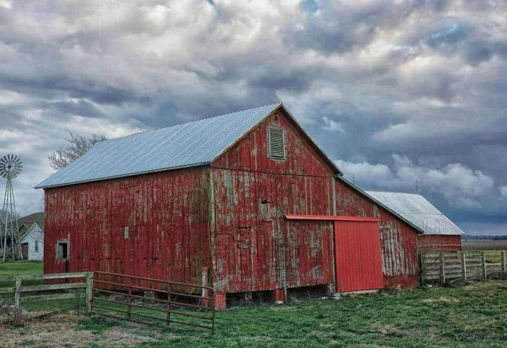An old red barn on a stormy winter afternoon in rural Central Illinois west of Monticello.
