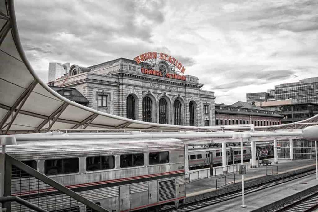 Selective color black and winter image of Union Station on an early morning in downtown Denver, Colorado.