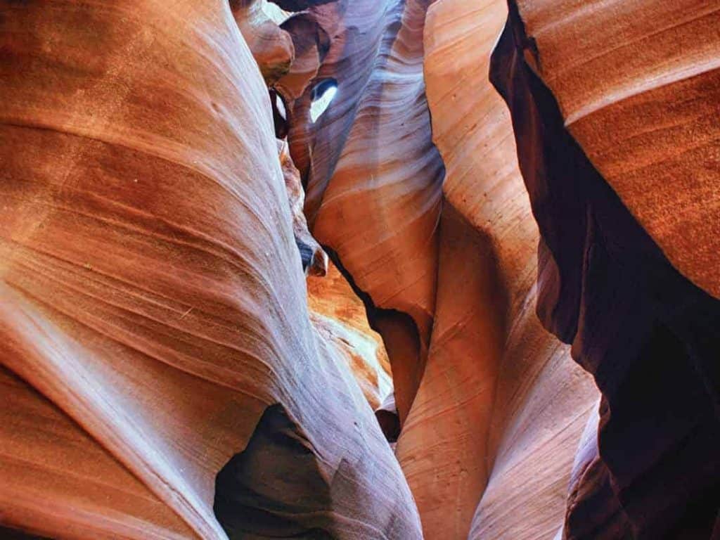 Tight contoured rock passages and narrow confined spaces of Antelope Canyon near Page, Arizona.