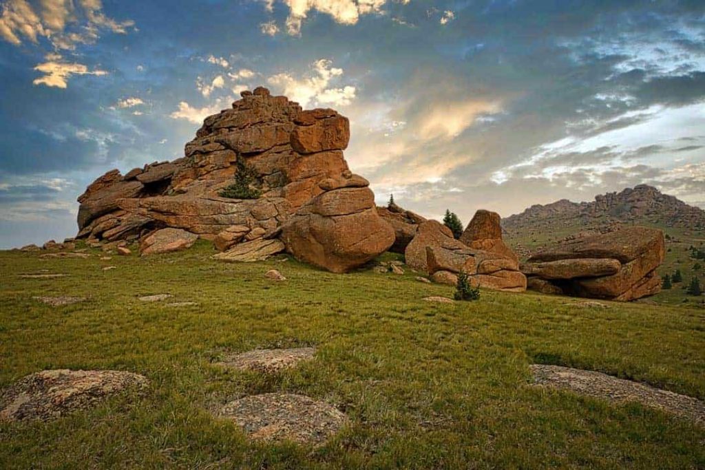 The expansive grassy alpine plateau beneath the summit of Bison Peak in the southern Tarryall Mountains of Colorado is filled with unique and striking granite rock formations, monoliths, and boulders.
