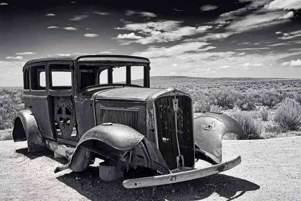 This lone 1932 Studebaker rests in the painted desert of Arizona, marking where a section of old Route 66 passed through Petrified Forest National Park.