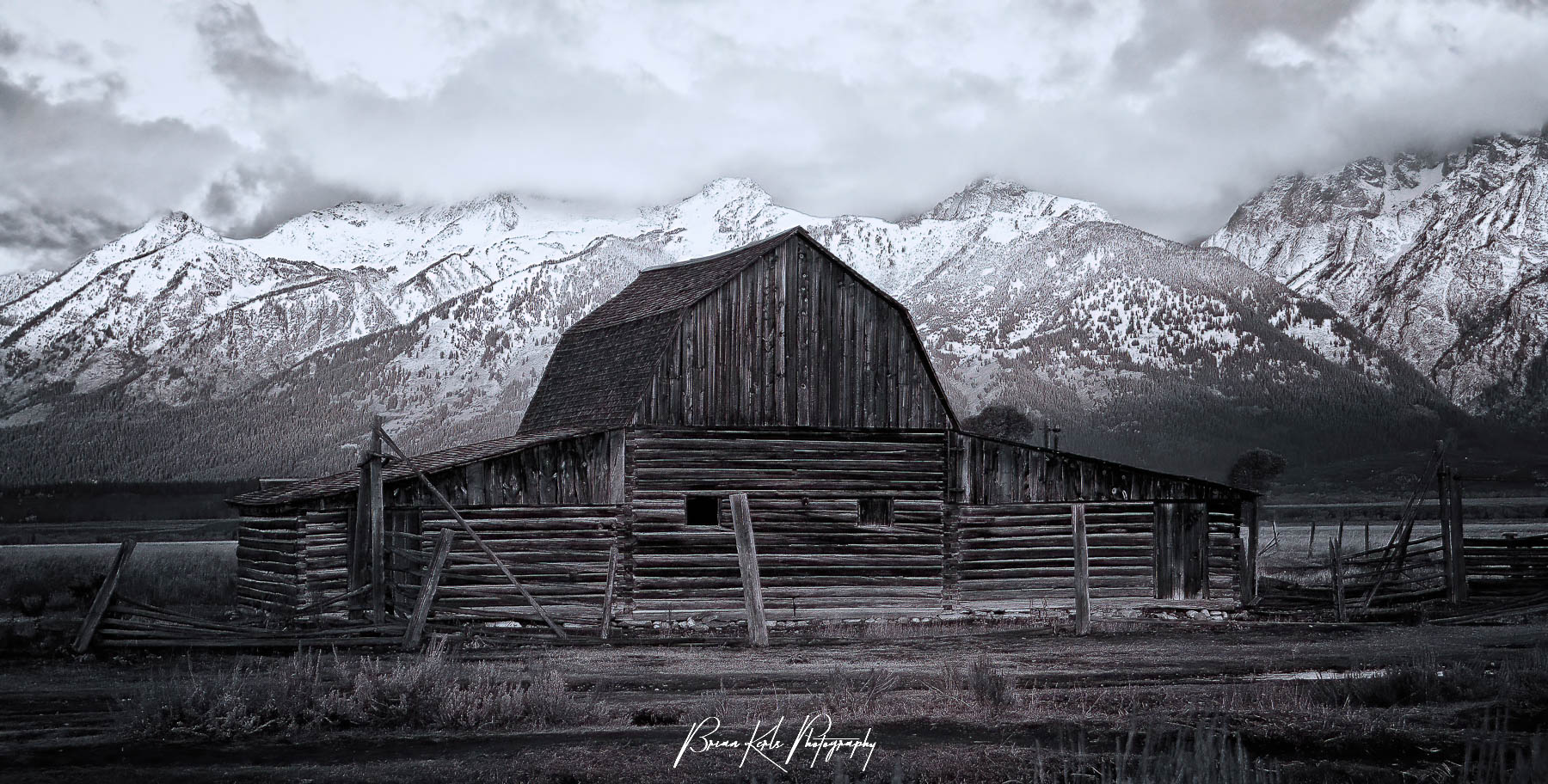 Black and White version of Sunrise at Moulton Barn on Mormon Row - Grand Teton National Park, Wyoming.