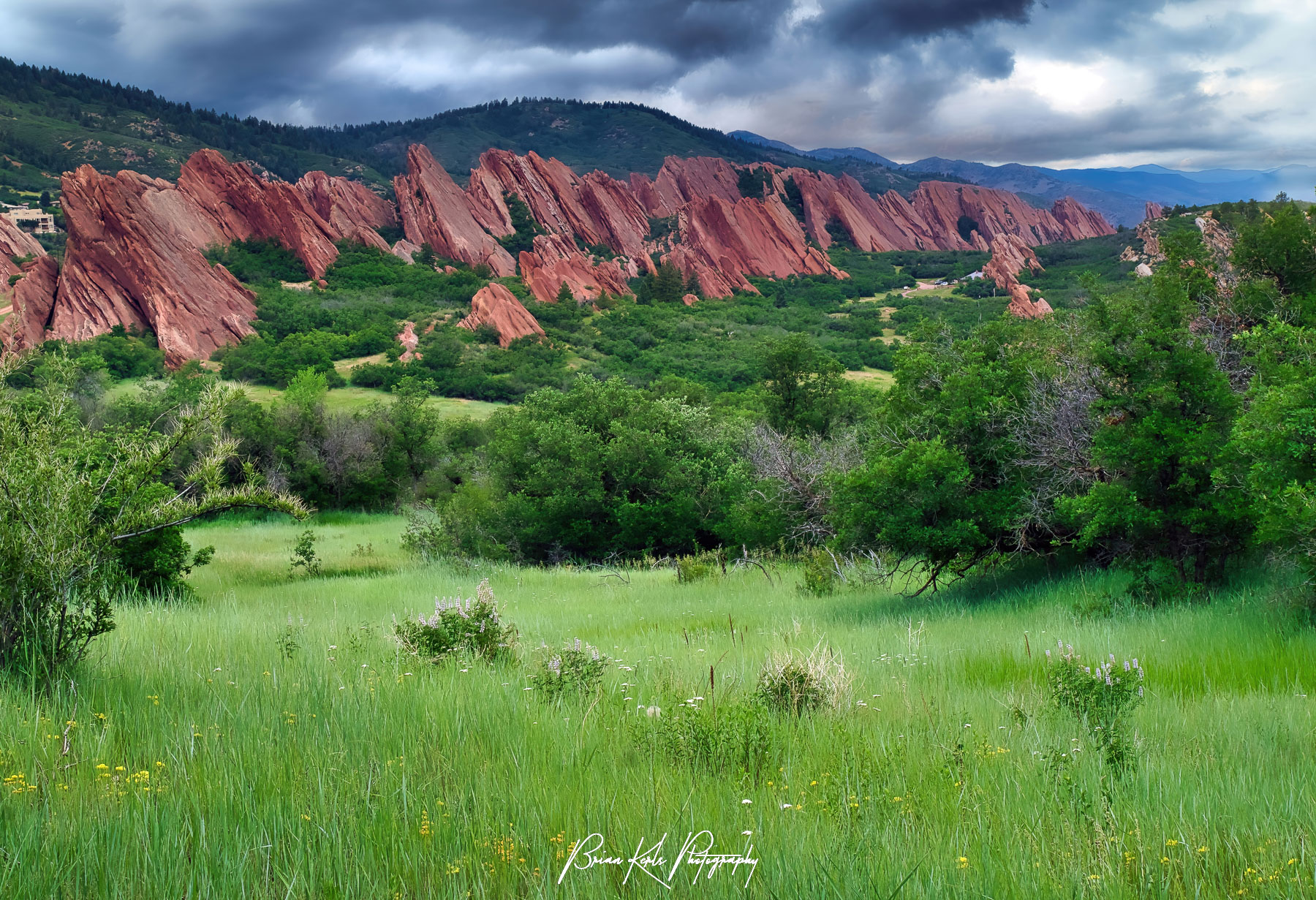 Known for its striking red sandstone rock formations, Roxborough State Park near Denver Colorado has no shortage of great views. Frequent spring and summer rainstorms have kept everything bright green, as well as making for interesting landscape photography conditions.