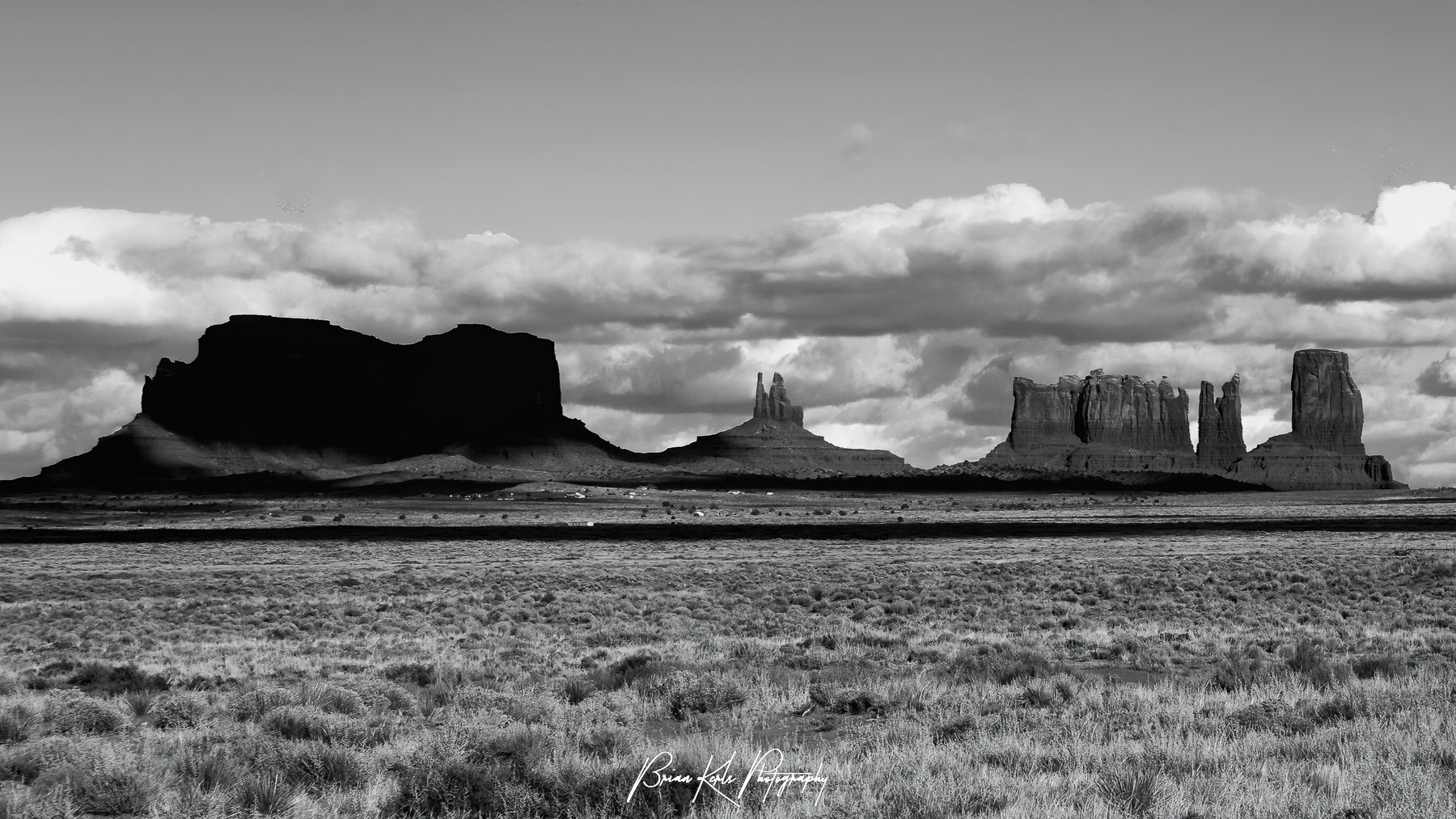 Along the Arizona – Utah border, Monument Valley is well known for its towering sandstone buttes and pillars and expansive skies. Black and white is the perfect medium for capturing the mood as afternoon clouds build and the shadows lengthen across these iconic rock formations of the American Southwest.