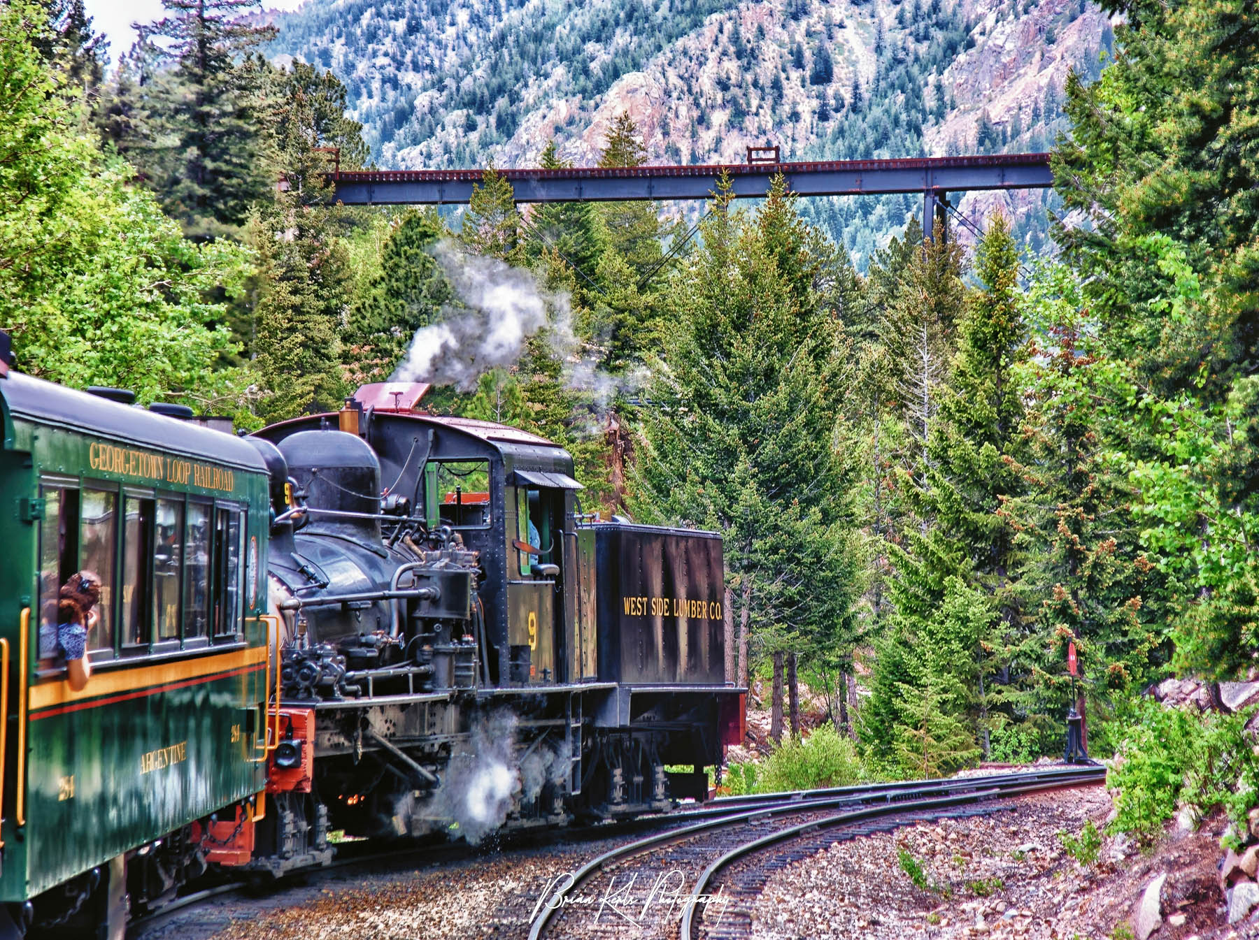 The Georgetown Loop railroad connects the once thriving Colorado mining towns of Georgetown and Silver Plume which lie 2 miles apart in a steep, narrow mountain canyon. Completed in 1884, this narrow gauge rail line was considered an engineering marvel for its time. It covers 3.1 winding miles of track, 640 feet of elevation gain, and crosses 4 bridges over Clear Creek, including the massive Devil's Gate High Bridge shown here.