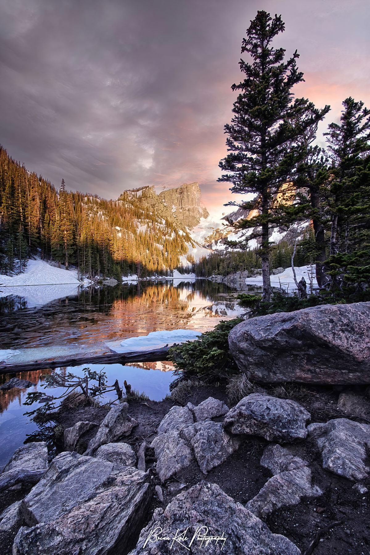 Dramatic dawn light falling over Dream Lake and Hallett Peak in Rocky Mountain National Park, Colorado.