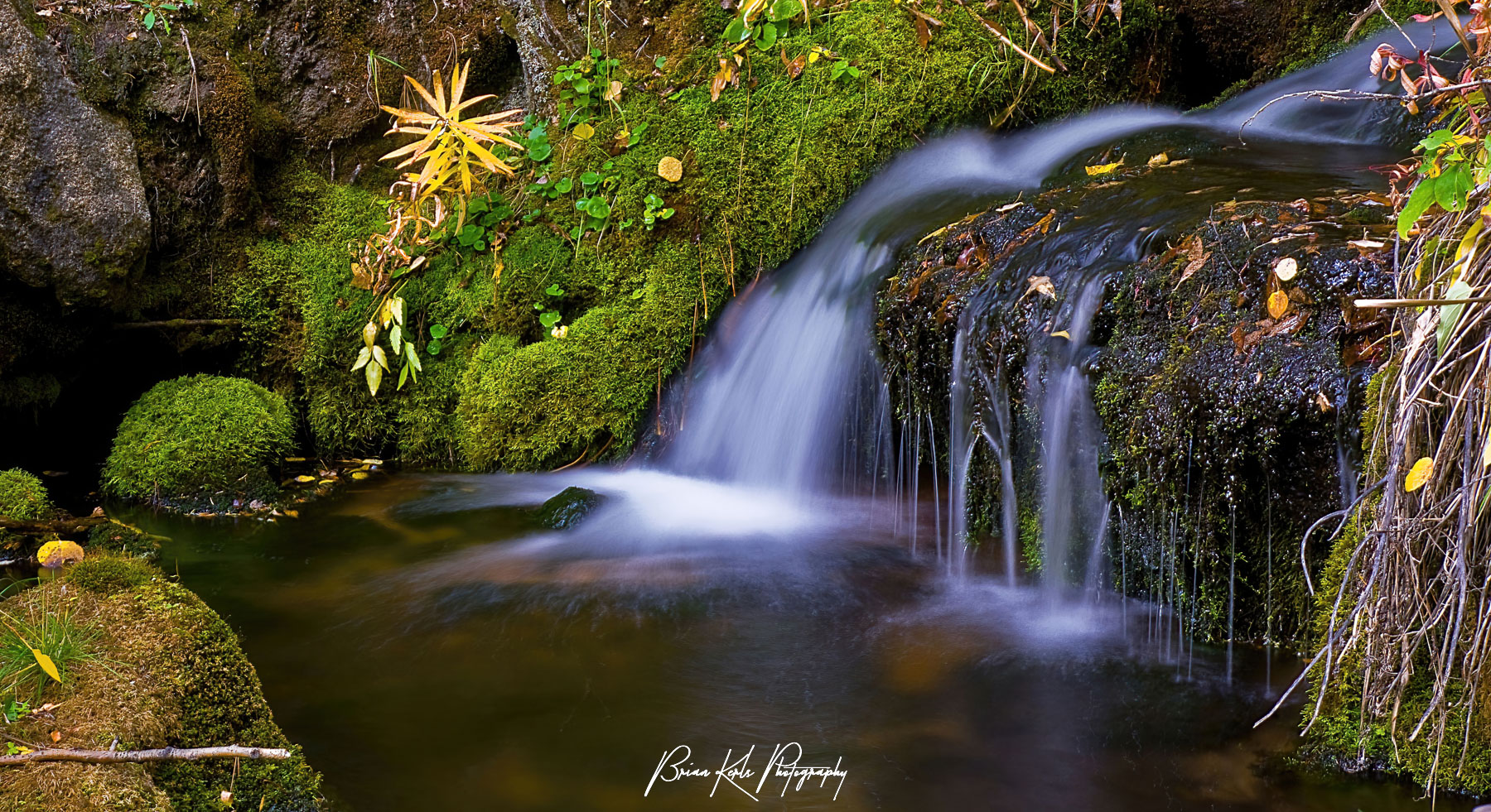 One of many small waterfalls along Ben Tyler Creek near Bailey, Colorado captured on a cool, autumn morning.