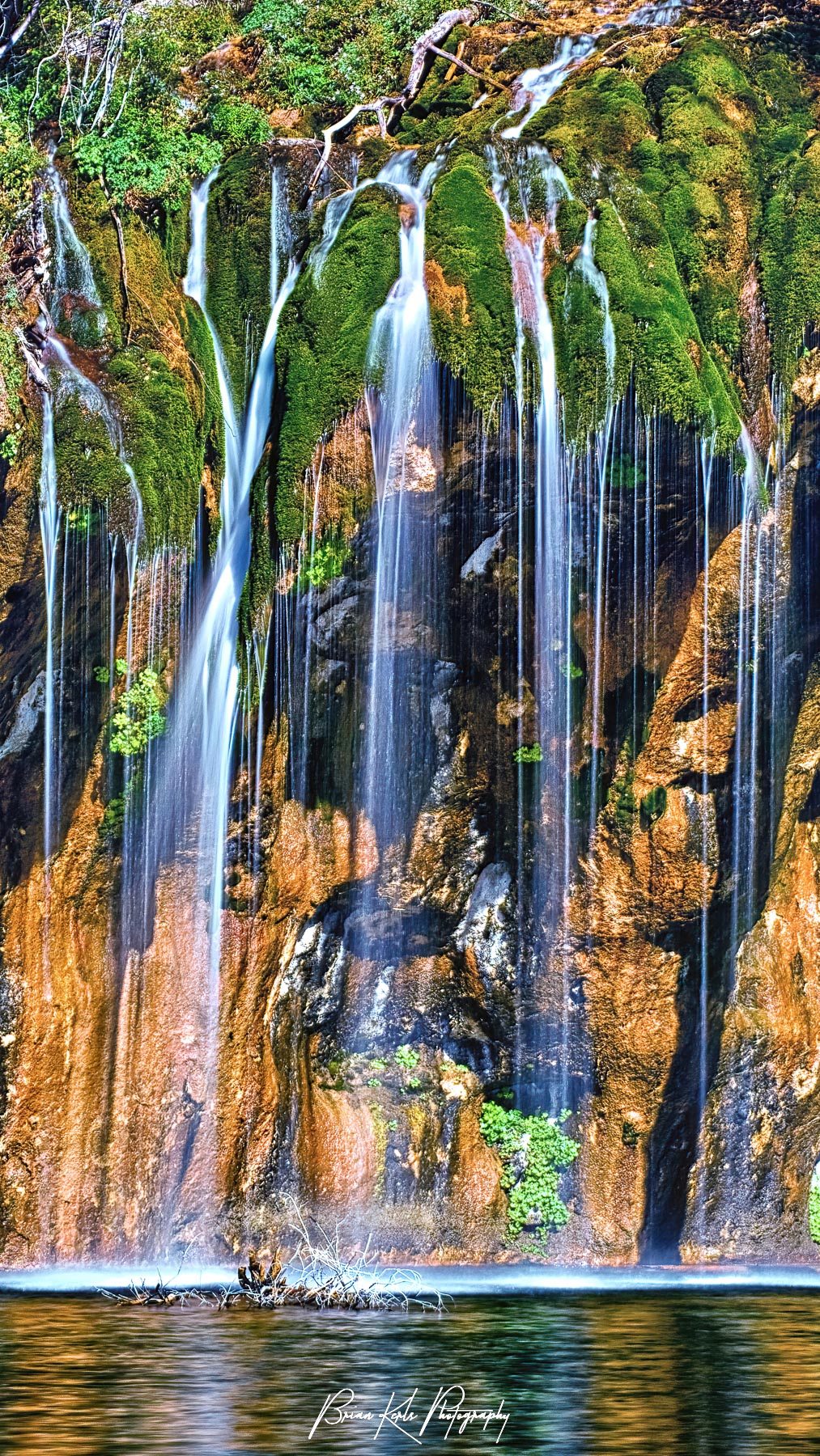 One of the two upper waterfalls cascading into Hanging Lake, near Glenwood Springs, Colorado.